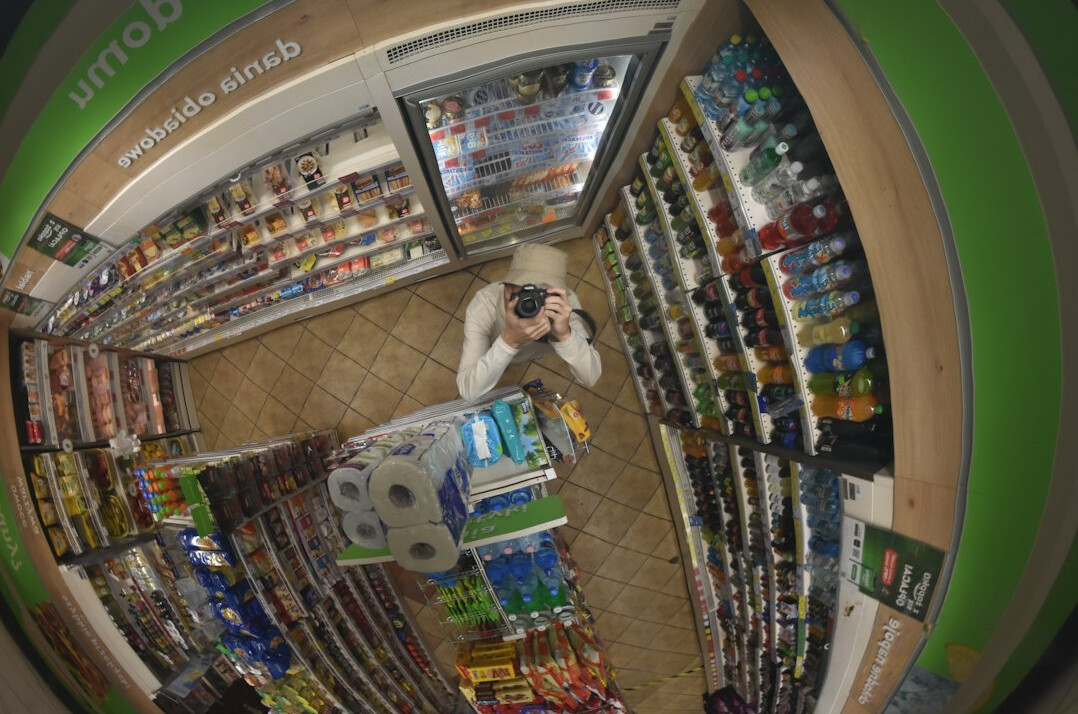 store security guard watching cameras