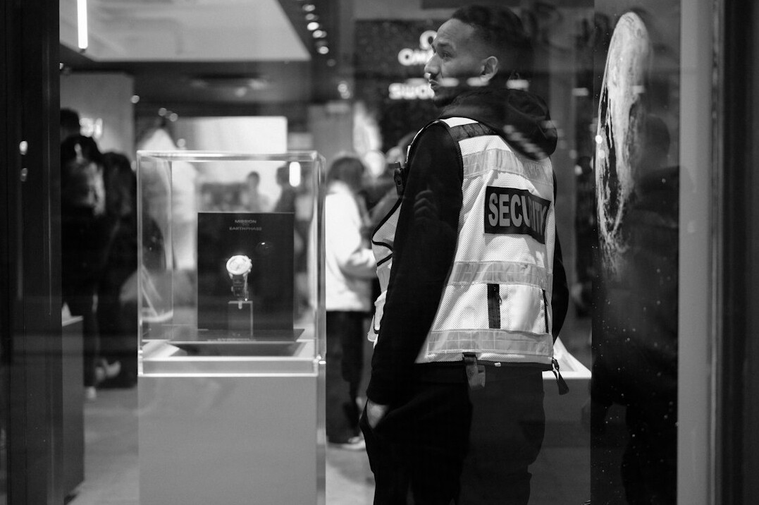 store detective watching camera