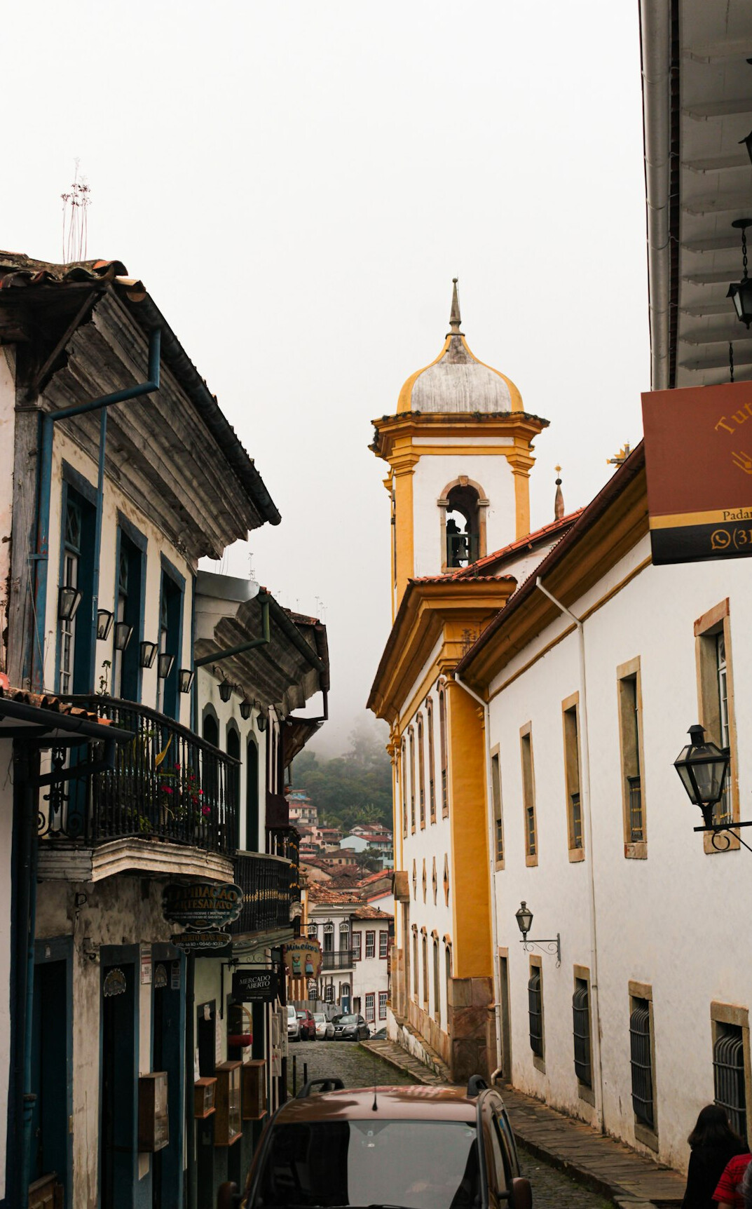 Foggy narrow street in a historic South American town
