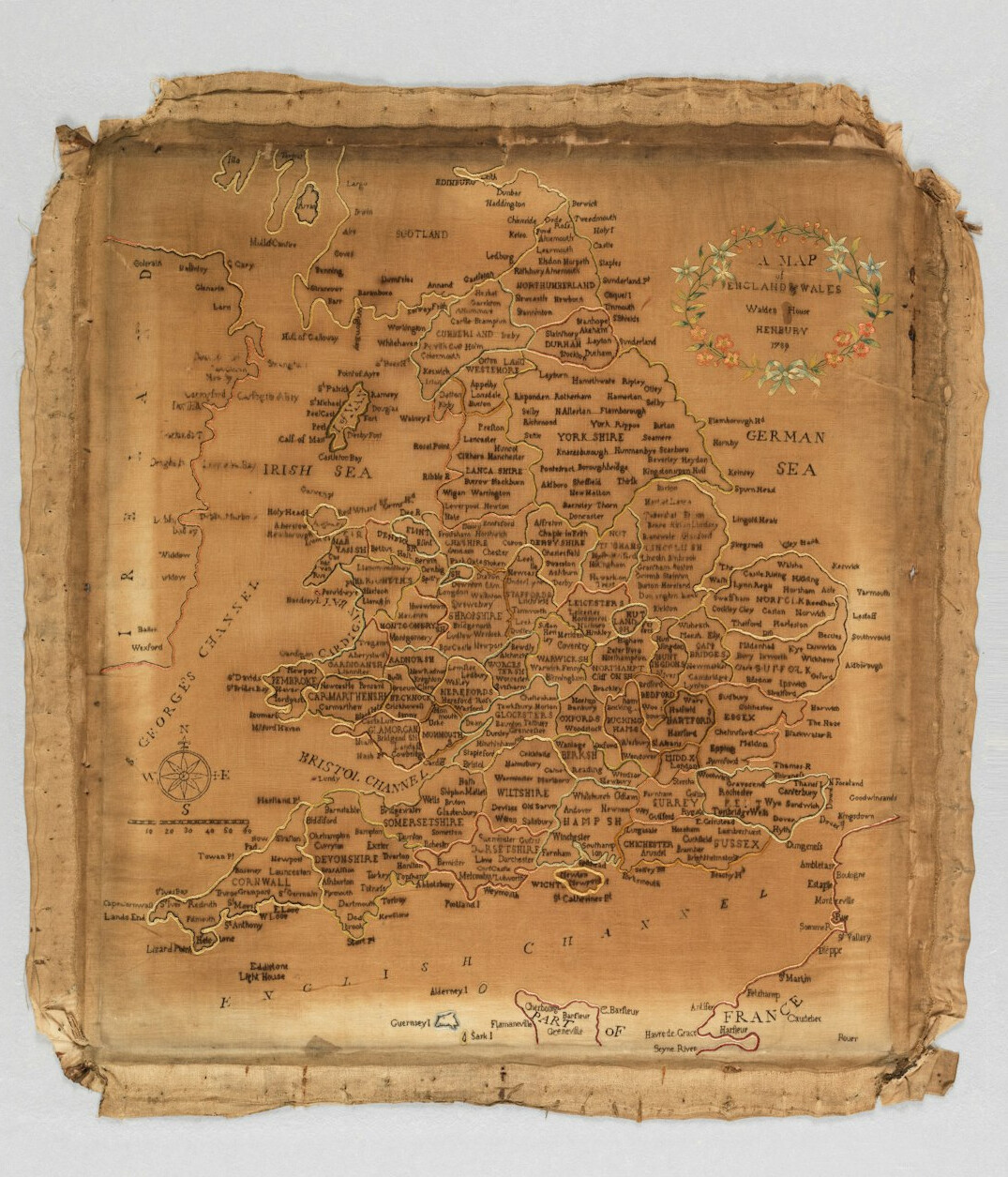 Old map and historical documents spread on a wooden desk