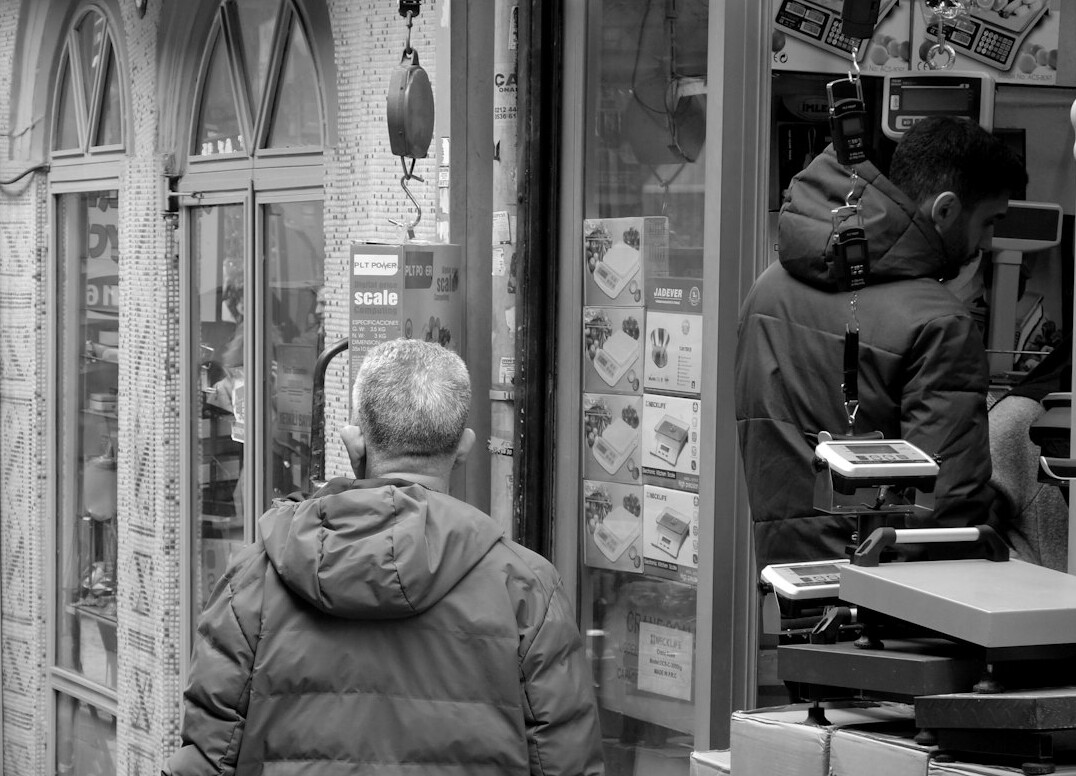 store security guard watching cameras
