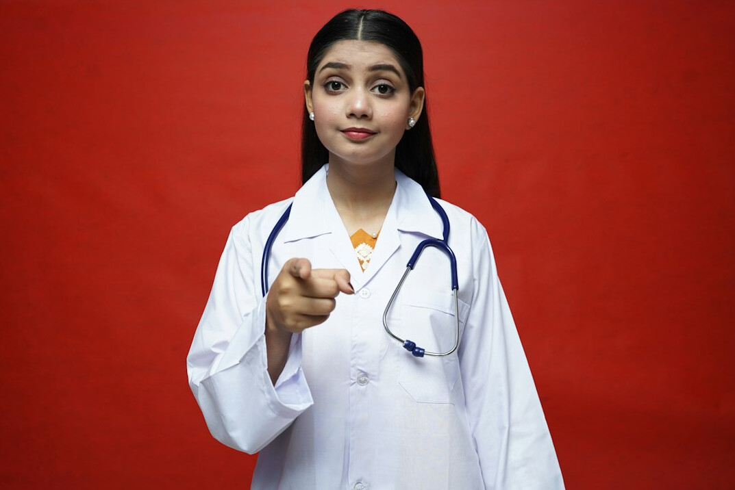 Studio portrait of a young Hispanic woman researcher